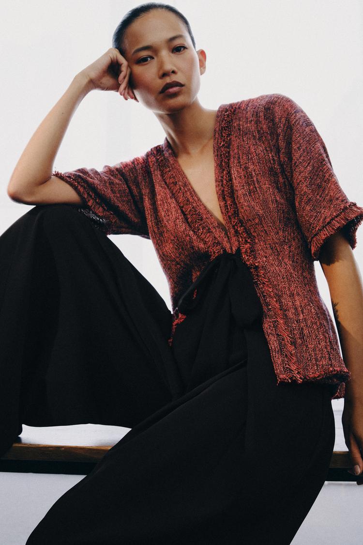 top s peplum detaljem