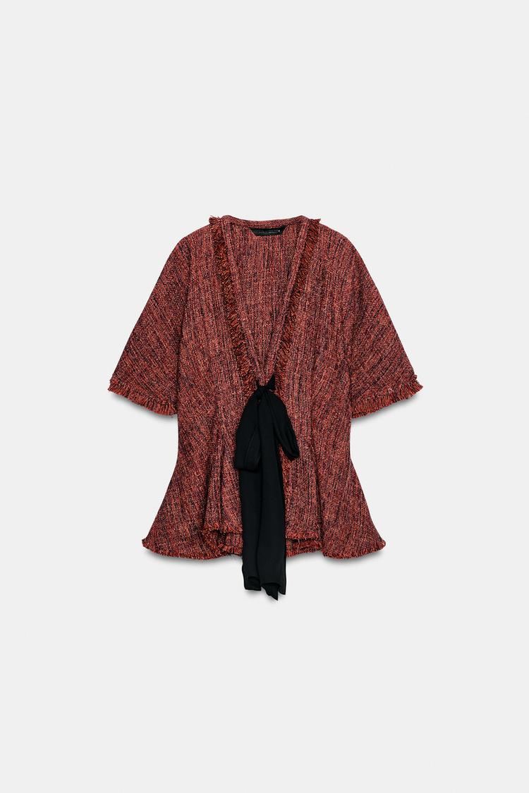 top s peplum detaljem