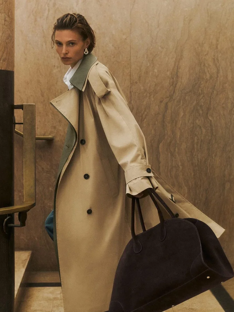 Photo by COS on August 21, 2024. May be an image of 1 person, duffle coat, overcoat and text.