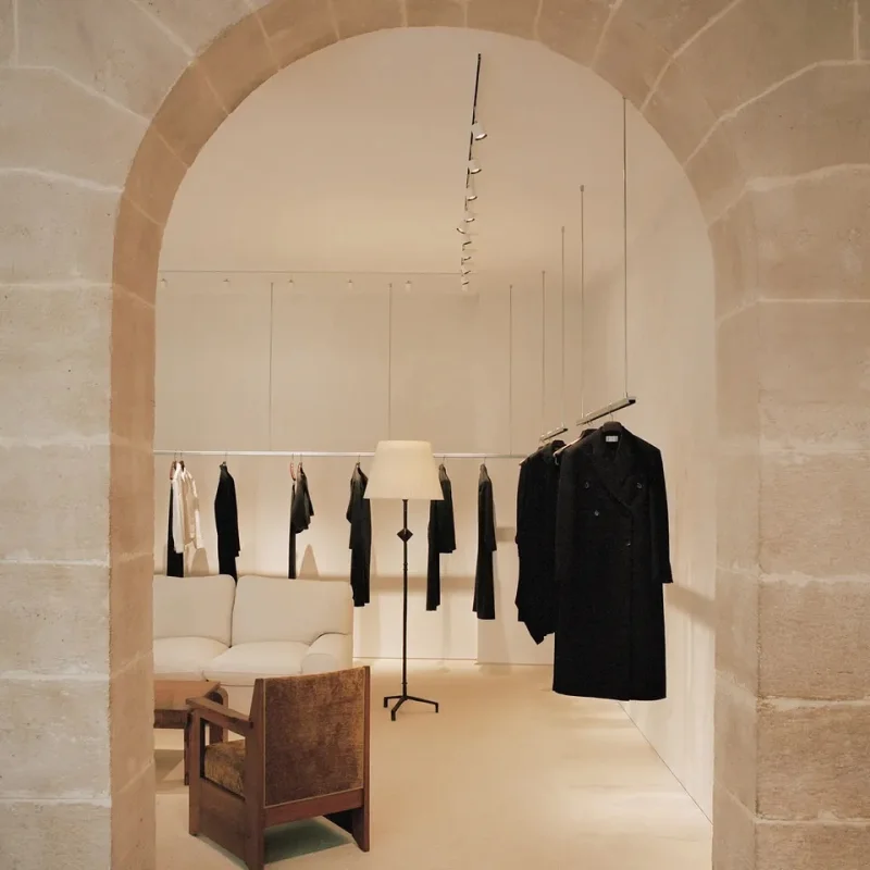 Photo shared by The Row Archive on September 23, 2024 tagging @therow, and @francoishalard. May be an image of display case, rack, indoors and hallway.